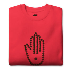 Bright pink sweatshirt with Tunisian-style hamsa with black dots.